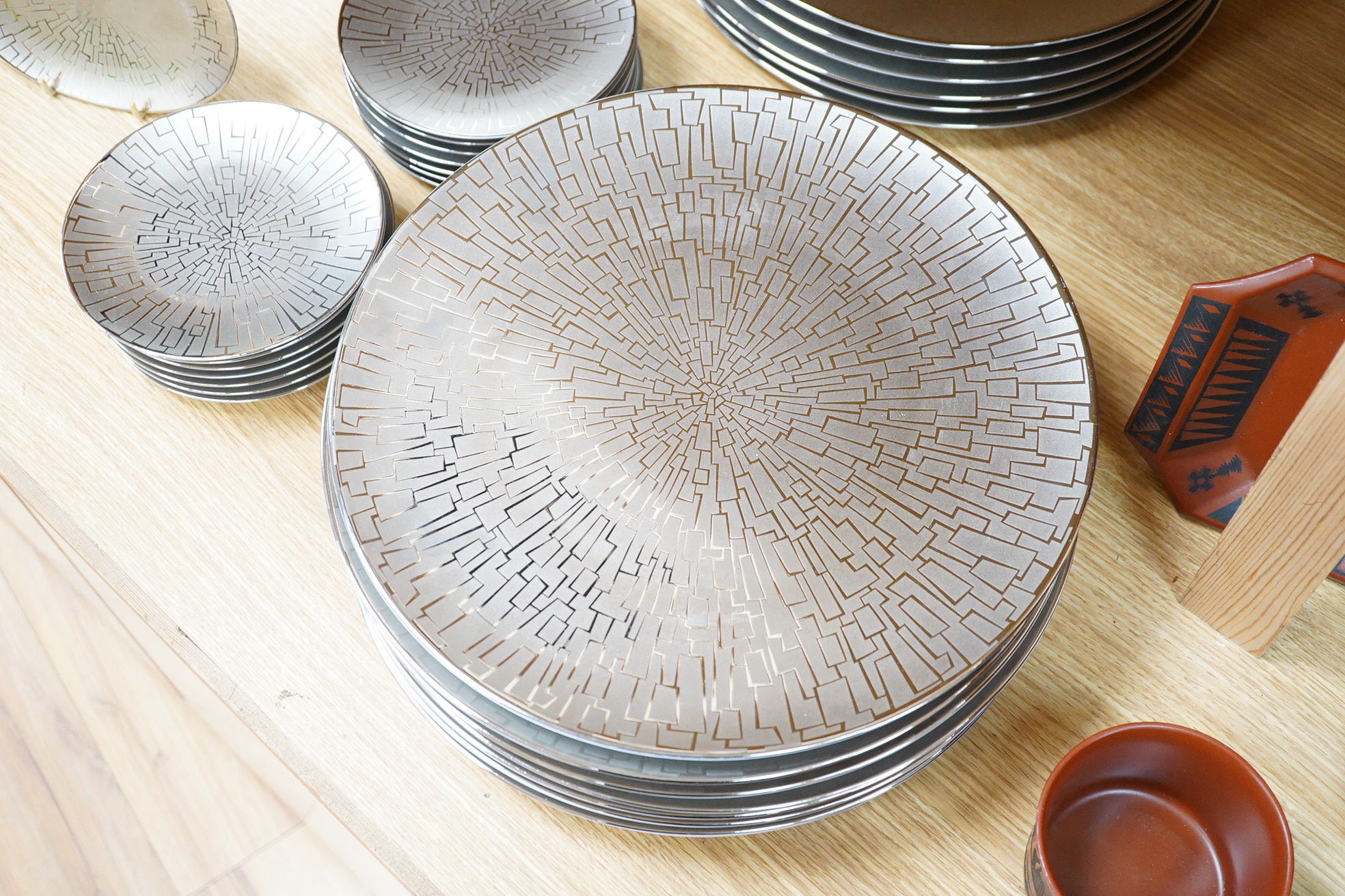 A collection of Rosenthal studio line TAC Gropius Skin platinum dinnerware, largest 33cm in diameter